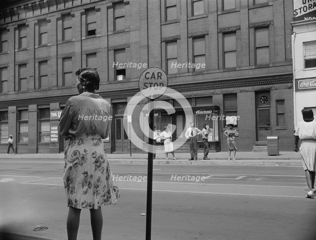 Waiting for the street car at 7th and Florida Avenue, N.W., Washington, D.C., 1942. Creator: Gordon Parks.
