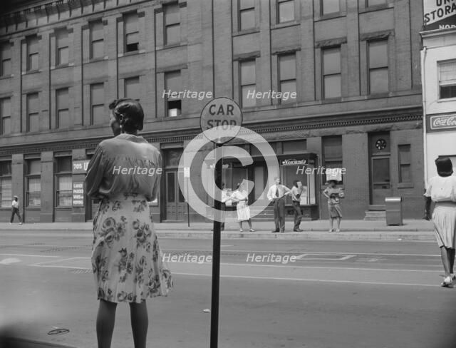 Waiting for the street car at 7th and Florida Avenue, N.W., Washington, D.C., 1942. Creator: Gordon Parks.
