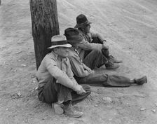Waiting for the semi-monthly relief checks at Calipatria, California, 1937. Creator: Dorothea Lange