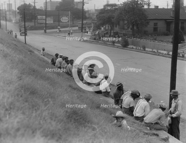 Waiting for the trucks to bring them to the cotton fields, Memphis, Tennessee, 1937. Creator: Dorothea Lange.
