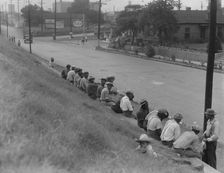 Waiting for the trucks to bring them to the cotton fields, Memphis, Tennessee, 1937. Creator: Dorothea Lange