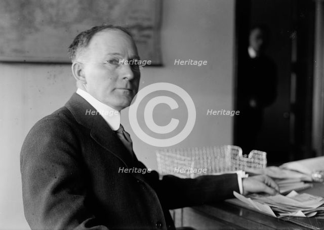 Walker D. Hines, Director General, U.S.R.R. Adm., at Desk, 1917. Creator: Harris & Ewing.