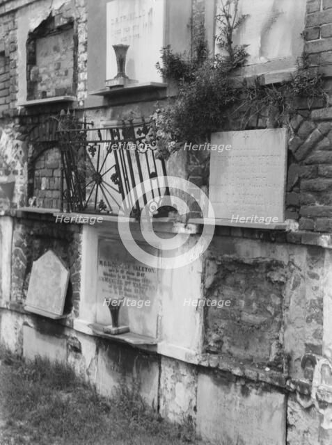 Wall tombs of the old St. Louis Cemetery, New Orleans, between 1920 and 1926. Creator: Arnold Genthe.