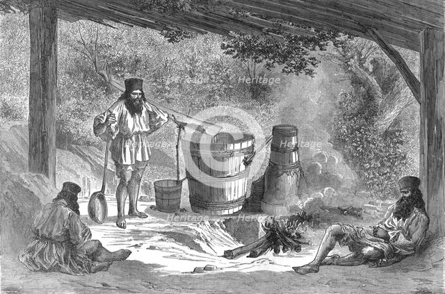 'Wallachians Distilling 'Slievovitz'; A Visit to the Danubian Principalities', 1875. Creator: Nelson Boyd.
