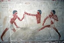 Wallpainting of 3 butchers cutting up a carcase, Tomb of Idut, 5th Dynasty, c2350 BC
