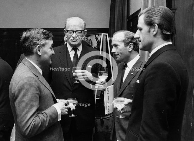 Walter Hayes, Patrick Hennesey, Colin Chapman, Graham Hill. Creator: Unknown.