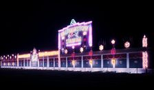 Walthamstow greyhound racing stadium illuminated to celebrate the Coronation of Elizabeth II, 1953. Creator: Arthur Charles Kirby Ware