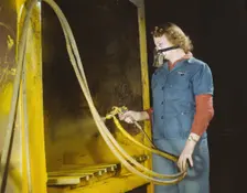 War production workers at the Heil Company making gasoline trailer..., Milwaukee, Wisconsin, 1943. Creator: Howard Hollem