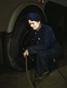 War production workers at the Heil Company making gasoline trailer tanks...Milwaukee, Wis, 1943. Creator: Howard Hollem