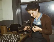 War production workers at the Vilter [Manufacturing] Company making M5..., Milwaukee, Wis. , 1943. Creator: Howard Hollem