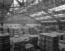 Warehouse at Spillers Animal Foods, Gainsborough, Lincolnshire, 1961. Creator: Michael Walters
