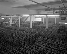 Warehouse full of crates of bottles, Ward & Sons, Swinton, South Yorkshire, 1960. Creator: Michael Walters