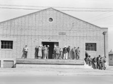 Warehouse, used as distributing office for FSA relief grants..., Bakersfield, California, 1938. Creator: Dorothea Lange