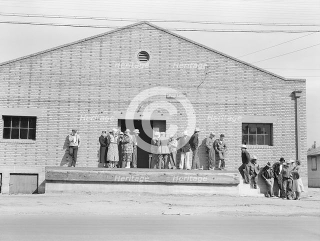 Warehouse, used as distributing office for FSA relief grants..., Bakersfield, California, 1938. Creator: Dorothea Lange.