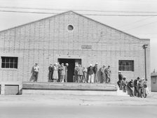 Warehouse, used as distributing office for FSA relief grants..., Bakersfield, California, 1938. Creator: Dorothea Lange