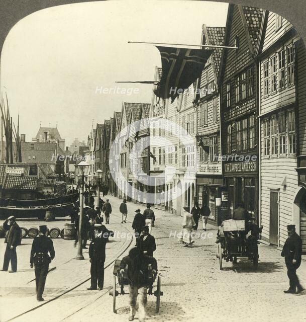 'Warehouses along the quay in  old town Bergen, for centuries the great fish mart of Norway', c1905. Creator: Unknown.