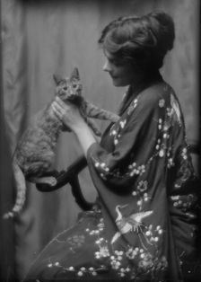 Warren, Gertrude, Miss, or Miss Jackman, with Buzzer the cat, portrait photograph, 1912 or 1913. Creator: Arnold Genthe