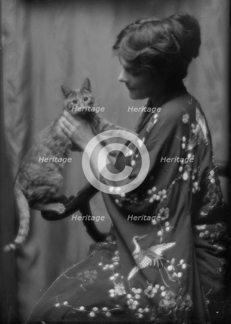 Warren, Gertrude, Miss, or Miss Jackman, with Buzzer the cat, portrait photograph, 1912 or 1913. Creator: Arnold Genthe.