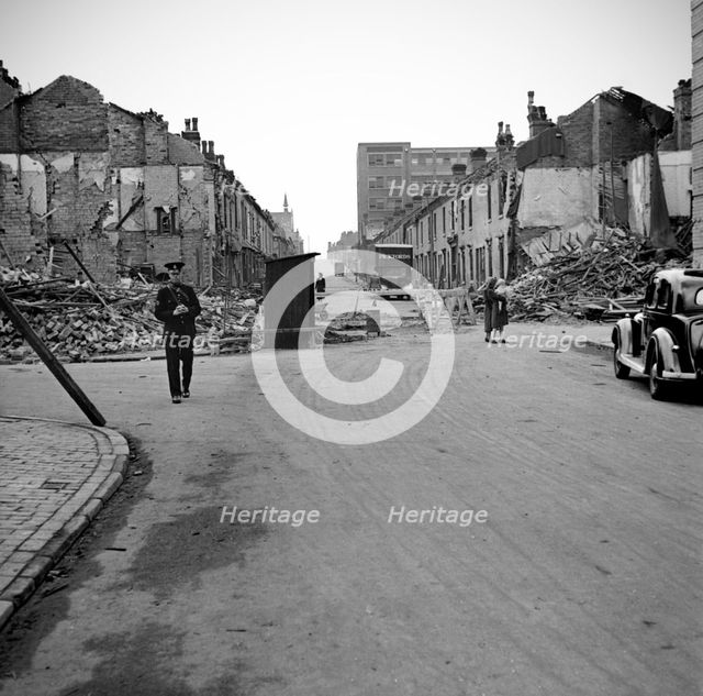 Wartime bomb damage, Long Acre, Nechells, Birmingham, West Midlands, World War II, 29 July 1942. Artist: James Nelson.