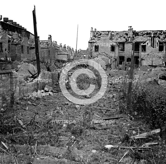 Wartime bomb damage, Long Acre, Nechells, Birmingham, West Midlands, World War II, 29 July 1942. Artist: James Nelson.