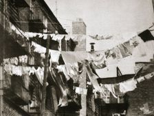 Wash day at some New York tenement buildings, USA, early 1930s. Creator: Unknown