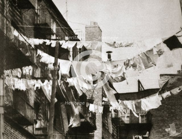 Wash day at some New York tenement buildings, USA, early 1930s.  Creator: Unknown.