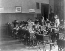 Washington, D.C. public schools, 6th Division - class using rulers and blocks, (1899?). Creator: Frances Benjamin Johnston