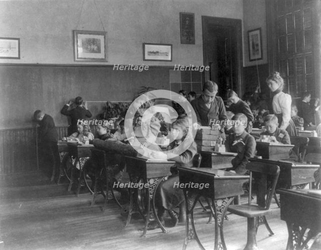 Washington, D.C. public schools, 6th Division - class using rulers and blocks, (1899?). Creator: Frances Benjamin Johnston.