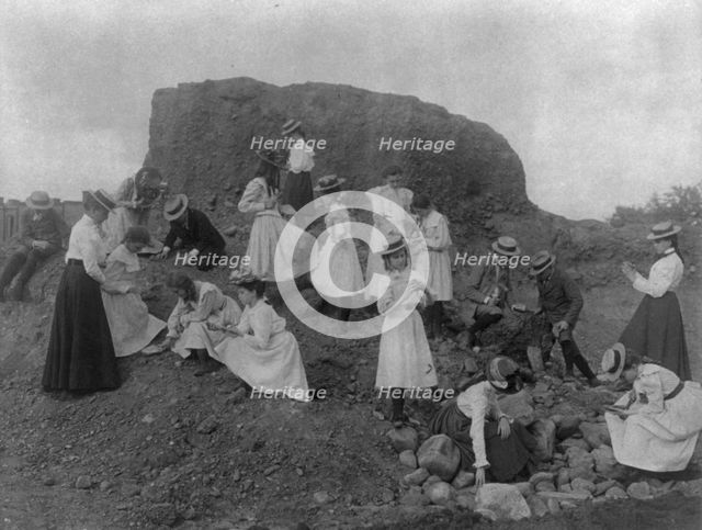 Washington, D.C. public schools field trip - 3rd Div. children examining rocks, (1899?). Creator: Frances Benjamin Johnston.