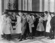 Washington, D.C. public schools - museum field trip - viewing exhibit case of George Wa..., (1899?). Creator: Frances Benjamin Johnston