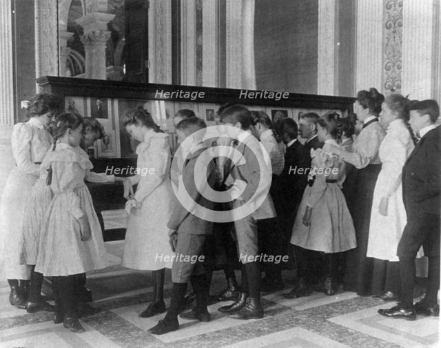Washington, D.C. public schools - museum field trip - viewing exhibit case of George Wa..., (1899?). Creator: Frances Benjamin Johnston.