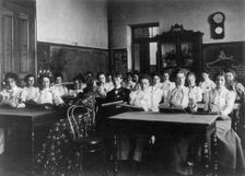 Washington, D.C. public schools - Normal School class examining flowers, (1899?). Creator: Frances Benjamin Johnston