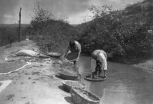 Washing wheat-San Juan, c1905. Creator: Edward Sheriff Curtis