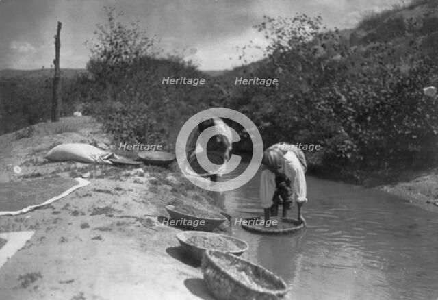 Washing wheat-San Juan, c1905. Creator: Edward Sheriff Curtis.