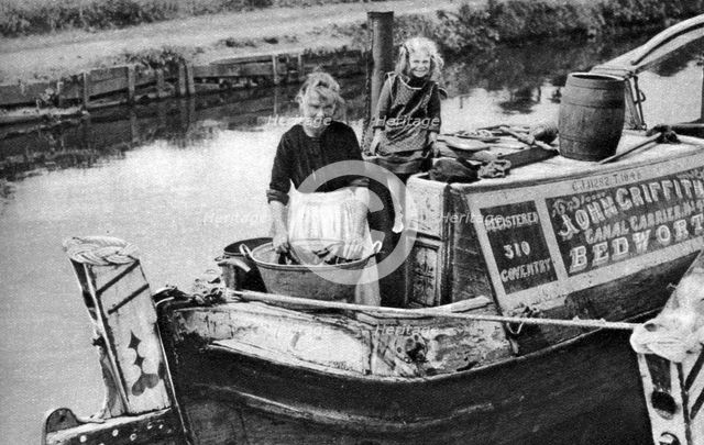 Washing day on the canal boat, 1926-1927. Artist: Unknown