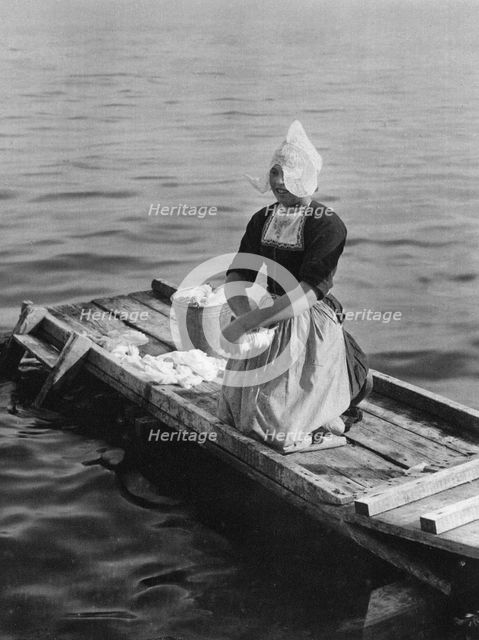 Washing in the Zuider Zee, Volendam, Netherlands, c1934. Artist: Unknown
