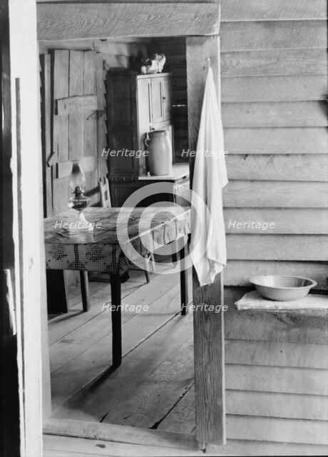 Washstand in the dog run and kitchen of Floyd Burroughs' cabin, Hale County, Alabama, 1936. Creator: Walker Evans.