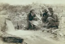 We have it rich Washing and panning gold, Rockerville, Dak Old timers, Spriggs, Lamb..., 1889. Creator: John C. H. Grabill