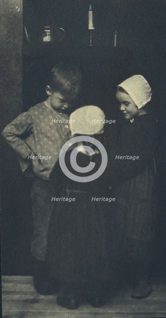 We're going to have warm potatoes!, c1900. Creator: Elizabeth B. Brownell.