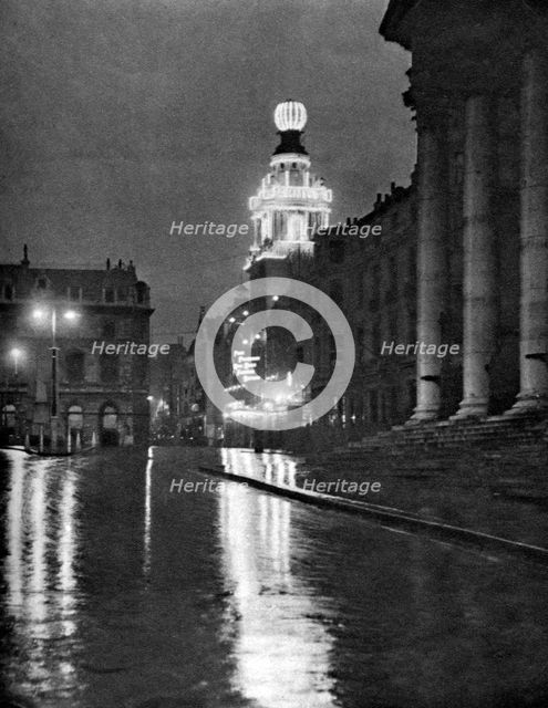 Wet weather in Trafalgar Square, London, 1926-1927. Artist: Paterson