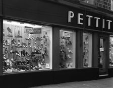 Wearra shoes, shop window display, Mexborough, South Yorkshire, 1960. Creator: Michael Walters