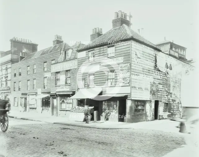 Weatherboard houses and shops on the Albert Embankment, Lambeth, London, 1900. Artist: Unknown.