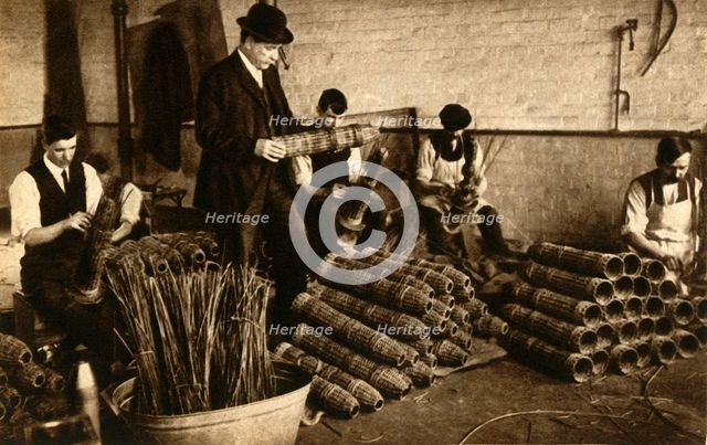 Weaving baskets for artillery shells, Nottingham, First World War, 1914-1918, (1933).  Creator: Unknown.