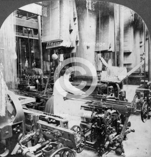 Weaving linen fabric, Montreal, Canada, early 20th century. Artist: Keystone View Company