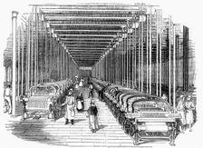Weaving shed fitted with rows of power looms driven by belt and shafting, c1840