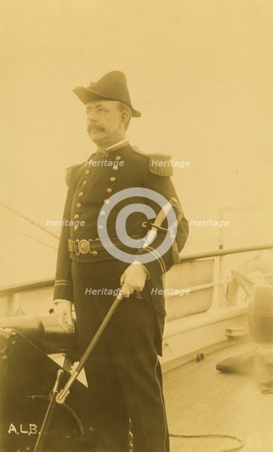 "Webber," a naval officer or ship captain, three-quarter length portrait, standing...,1894 or 95. Creator: Alfred Lee Broadbent.