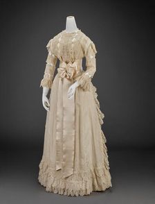 Wedding Dress (Skirt, Bodice, Petticoat, Two Sleeves, Two Mitts, Sash, Bow, Waist Piece), 1898. Creator: Unknown