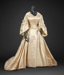 Wedding Dress (Skirt, Bodice, Peplum, Pair of Gloves), about 1870. Creator: Unknown