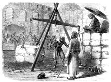 Weighing cotton at Bombay for the English market, 1862. Creator: Joseph Austin Benwell