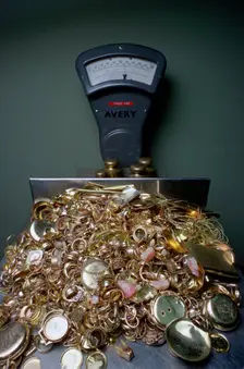 Weighing gold scrap, Hatton Garden, London. Creator: Tony Evans